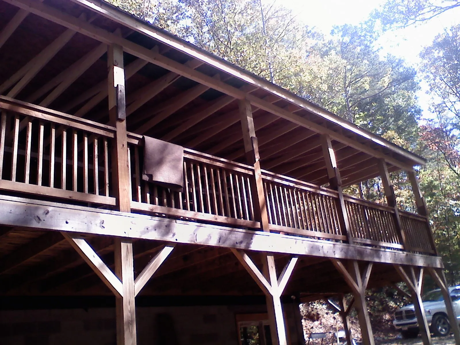 Timber framing under a new elevated porch and deck — Roof Leak Repair in Roxboro by Roofing Brothers